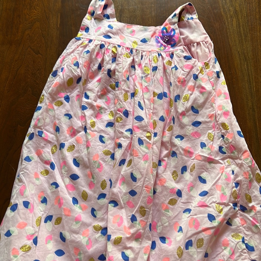 Pink dress with gold, white, pink, and blue leaves. Size 4 kids. Lightweight.